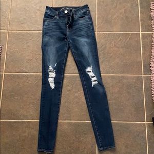 dark blue american eagle ripped skinny jeans